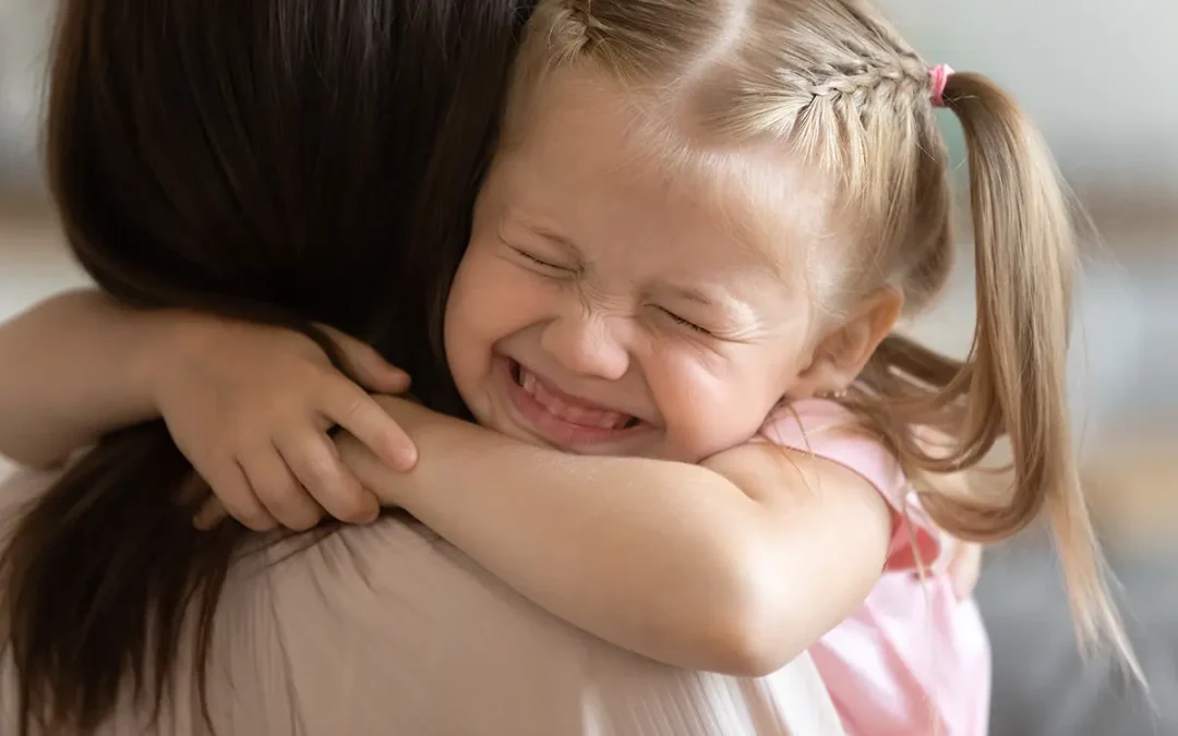 child hugging mom